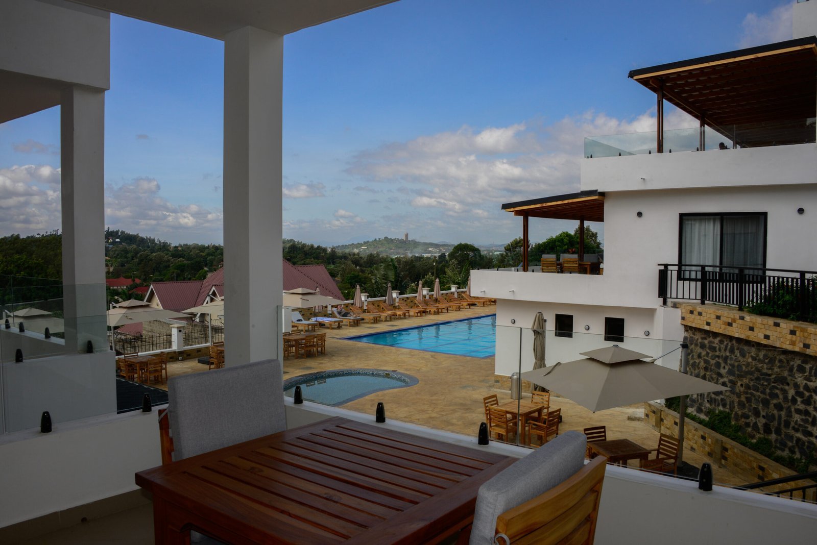 View from a Moshono Hillside balcony over the Arusha landscape at golden hour
